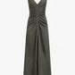 The Remi Dress by Proenza Schouler features a sleeveless olive green flared silhouette, deep V-neckline, and center-front ruching that extends to a long, flowing skirt made from Eco Stretch Linen.
