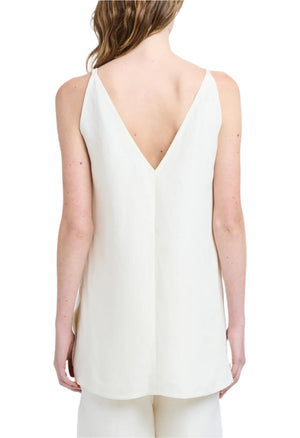 A woman photographed from behind against a white background wears the sleeveless Mitchell Top by Proenza Schouler and matching pants.