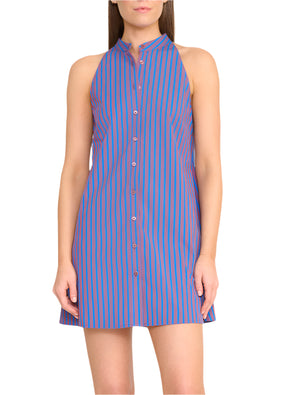 A woman wears the Staud Shirley Mini Dress, a sleeveless, button-front style with blue and pink vertical stripes, standing against a plain background.