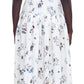 Viewed from the back against a plain background, a person wears the Arden Dress by Adam Lippes, a white sleeveless piece with floral patterns and a structured band collar, elegantly merging delicate design with luxurious Italian cotton poplin.
