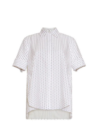 The Trapeze Sashiko Stripe Shirt by Adam Lippes features short sleeves, a collared button-up design, chic stripes, an architectural silhouette, and a slightly longer back hem, all crafted from fine Italian cotton.