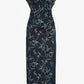 The Anais Dress by Proenza Schouler is a long Printed Stretch Cady dress featuring a dark blue and black background adorned with an all-over botanical vine pattern inspired by Brazilian night orchids, accented with subtle draping and asymmetrical cap sleeves.