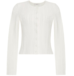 The Faye Compact Jacquard Knit Cardigan by Adam Lippes features long sleeves, a round neckline, and front button closure, shown on a plain background.