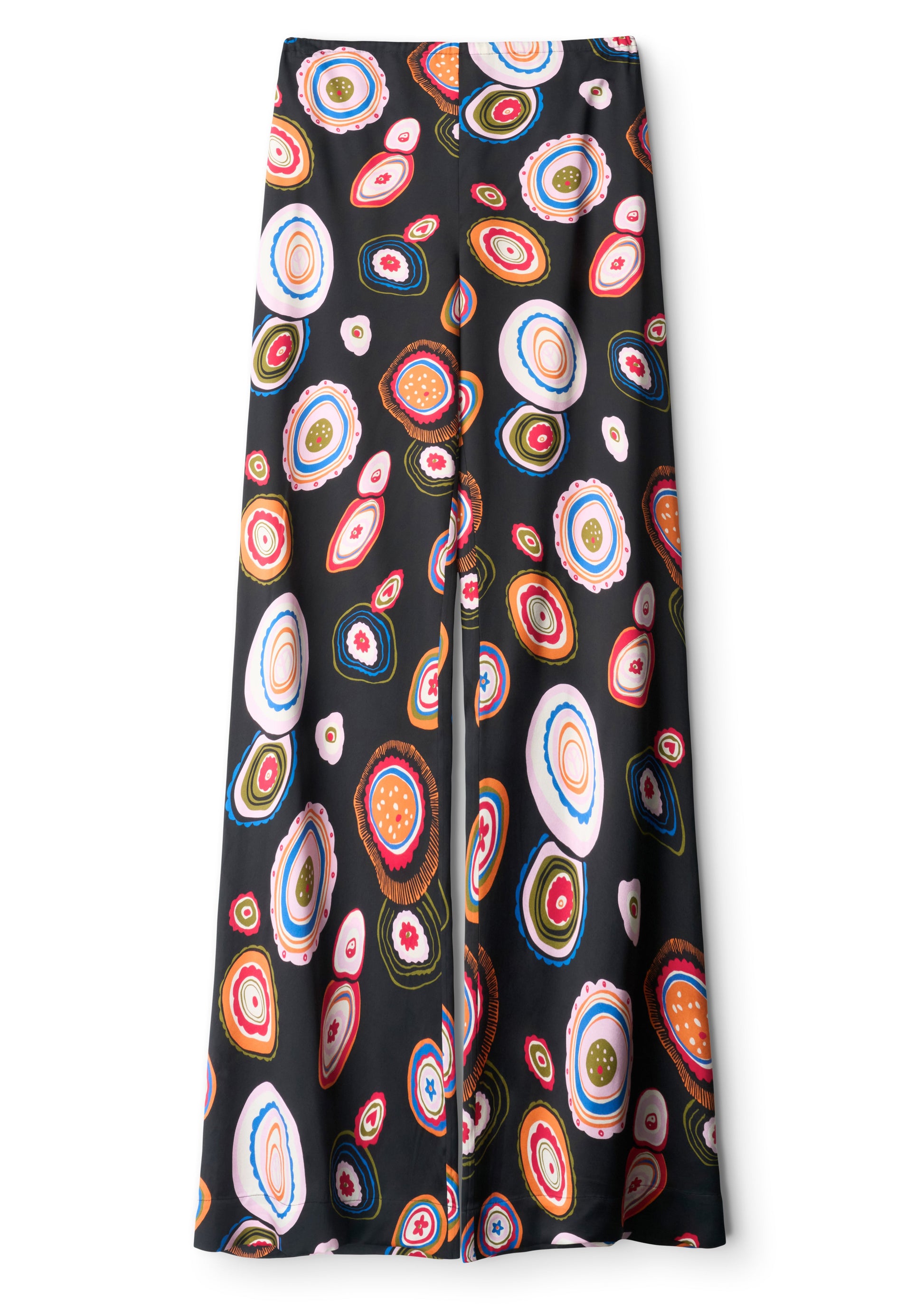 Staud’s Stroll Silk Pant features an effortless drape and a flared cut, adorned with a colorful, abstract concentric circle pattern in red, orange, blue, green, and white.