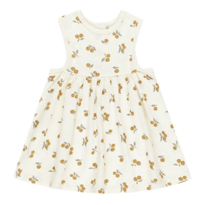 The Rylee & Cru Baby Girls' and Girls' Layla Dress is a sleeveless cream cotton jersey dress with a gathered skirt, featuring an all-over yellow and brown fruit print.