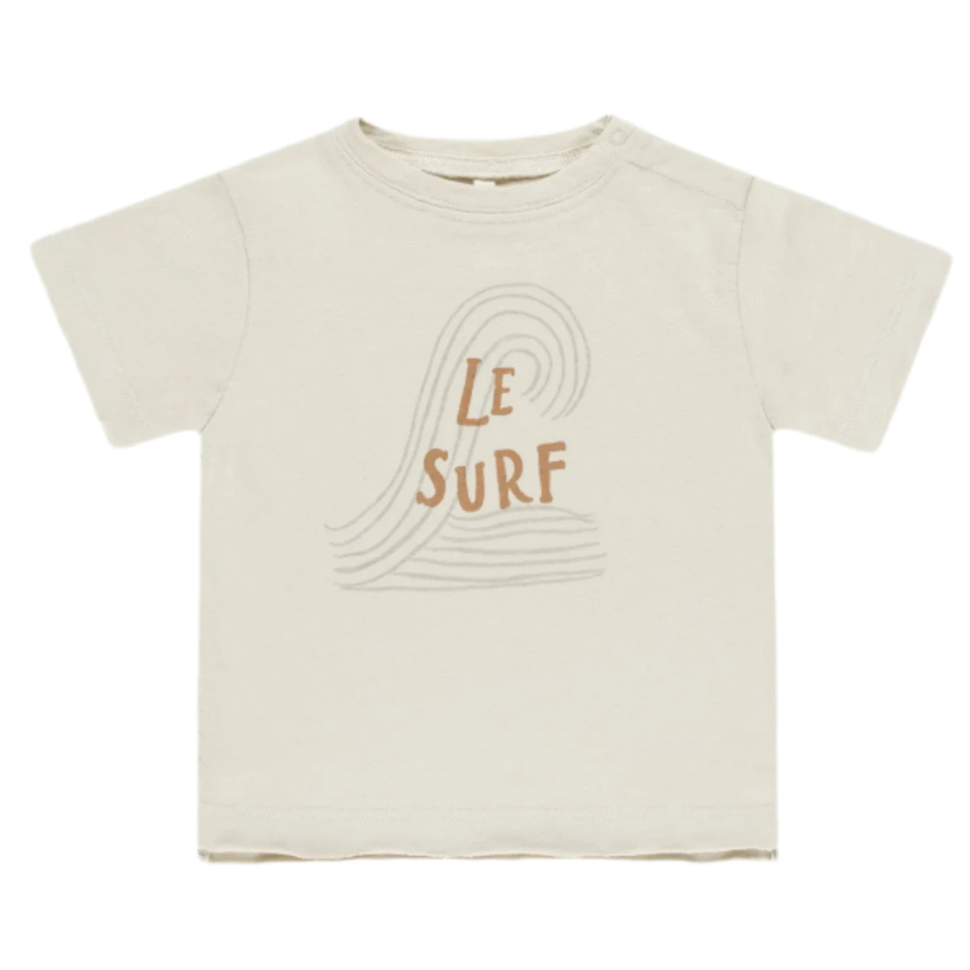 The Rylee & Cru Baby Boys' and Boys' Raw Edge Tee features soft beige cotton slub fabric, a simple wave line drawing, and “Le Surf” printed on the front in brown letters.