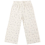 Girls’ Wide Leg Pant from Rylee & Cru, featuring a cream color with a small, all-over floral print in muted tones and designed with an elastic waistband for an easy pull-on fit, is laid flat on a white background.