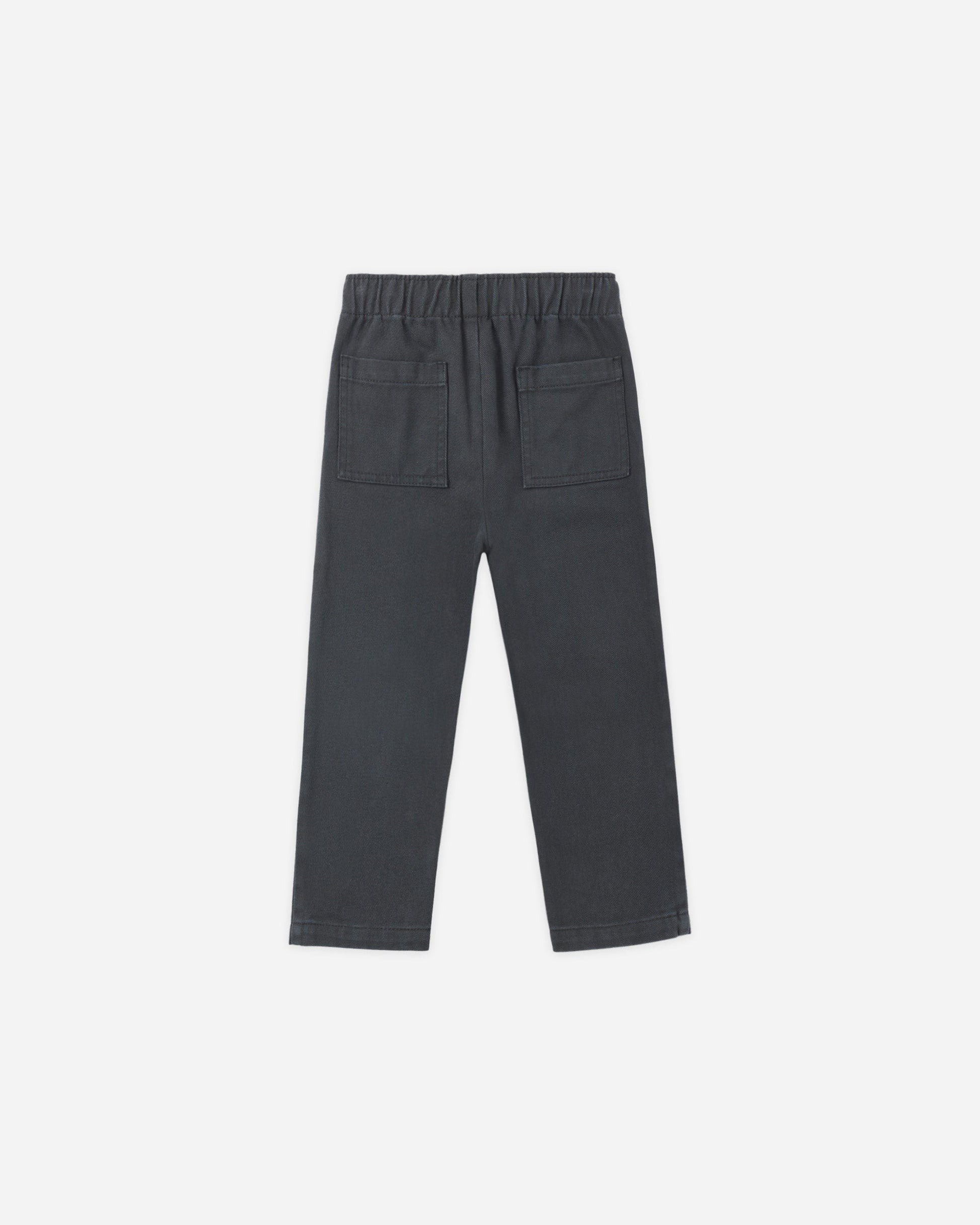 The Baby Boys’ and Boys’ Kalen Pant by Rylee & Cru is displayed from the back in dark gray, highlighting its elastic waistband with adjustable drawstrings and two square back pockets, laid flat on a white background.