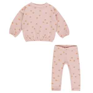 The Rylee & Cru Baby Girls' and Girls' Spongy Knit Set features a light pink long-sleeve top and elastic waist leggings, both with an all-over brown starfish print.
