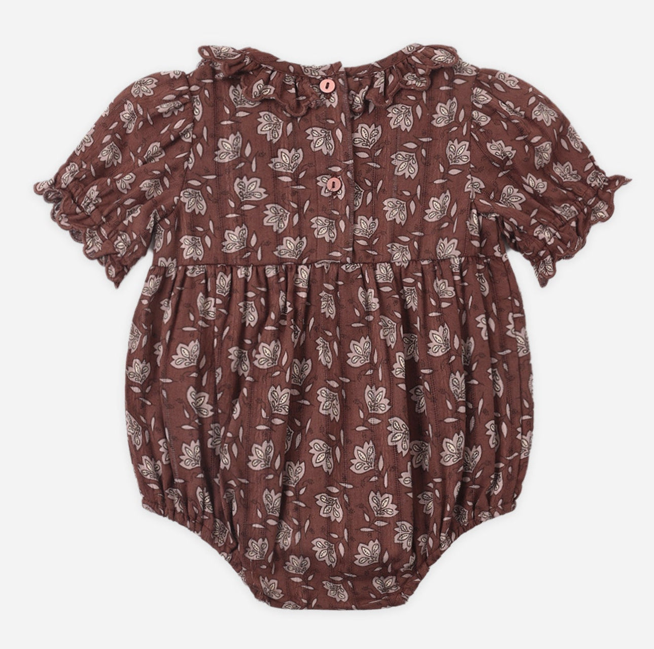 The Rylee & Cru Baby Girls’ Liv Romper is a vintage-inspired brown bubble romper featuring short sleeves, a scalloped ruffled collar, and a white floral pattern. Designed with front buttons and elastic leg openings for comfort, the garment is displayed laid flat on a white background.