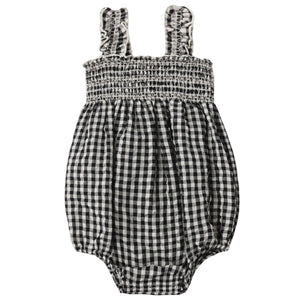 The Rylee & Cru Baby Girls' Julia Romper, shown in black and white gingham with ruffle detail and shoulder straps, is displayed against a white background.