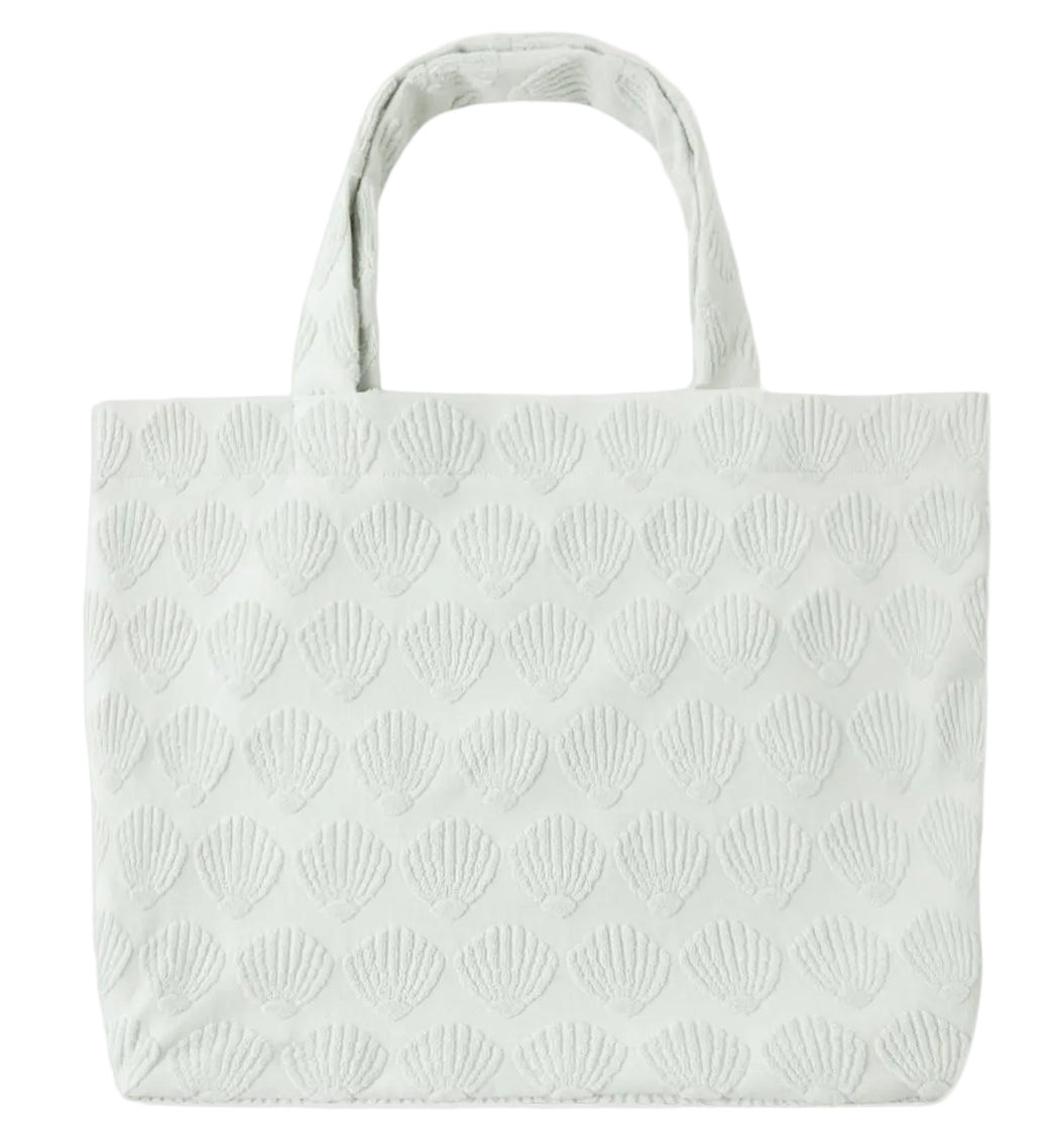 Light-colored Rylee & Cru Beach Bag with a textured scallop shell pattern and two handles, displayed against a white background—an ideal everyday accessory.