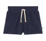 Cozmo Boys' Root Terry Shorts in navy blue, featuring an elastic waistband and adjustable white drawstring, shown on a white background.