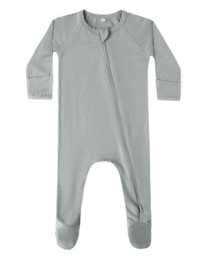 The Quincy Mae Baby Bamboo Zip Footie is a light gray, long-sleeve onesie with covered feet and an asymmetrical zipper from neck to left leg.