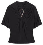 Lanvin Summer Top with Eyelet Detail with a keyhole neckline, flutter sleeves, and eyelet detail top.