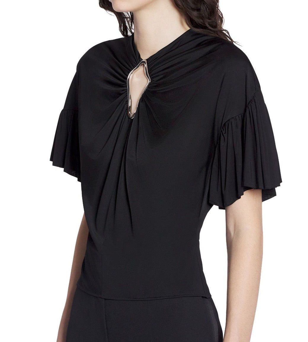 Woman wearing a Lanvin Summer Top with Eyelet Detail, featuring a draped neckline and ruffled sleeves.