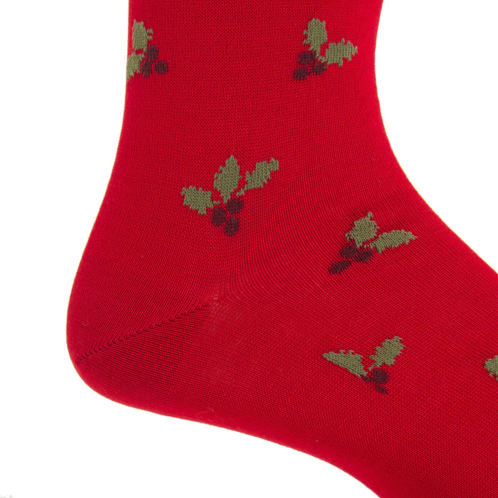 Close-up of Dapper Classics’ Red with Burgundy Berry and Pine Green Holly Wool Sock (Linked-Toe Mid-Calf) featuring a festive holly pattern. Crafted for comfort from breathable wool.