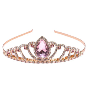 The Great Pretenders Boutique Regal Tiara features a gold band with clear stones and a central pink teardrop gem—perfect for adding elegance to any outfit.