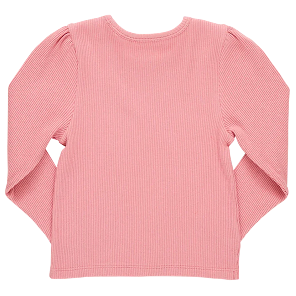 The **Pink Chicken Girls' Organic Camella Rib Top** is a pink long-sleeve shirt featuring a ribbed texture, shown from the back. Made from GOTS-certified organic cotton and adorned with eco-friendly inks and dyes, this top combines style with sustainability.