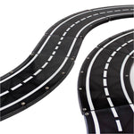 Close-up of a black plastic toy race track with white lane markings and visible screws, designed for modular builds. Inspired by the Magnatiles XTRAS: Roads 12-Piece Set.