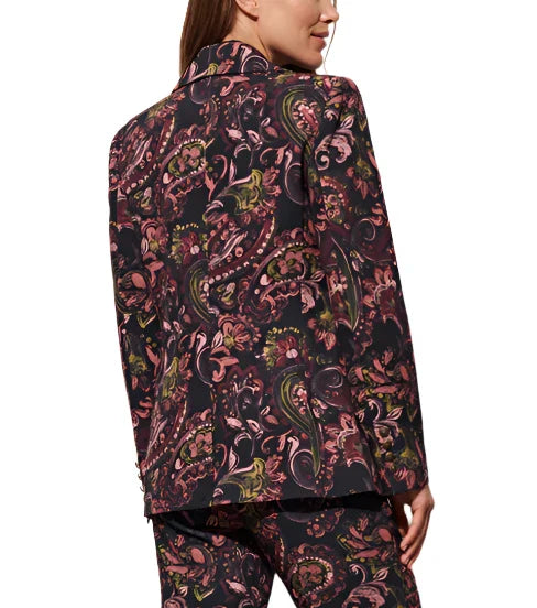 A person is shown from the back, wearing the Figue Robin Blazer, which features a dark floral pattern perfect for fall.