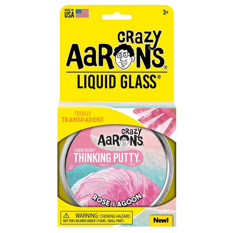 Packaging of Crazy Aaron's Liquid Glass Thinking Putty from Crazy Aarons in the Falling Water variant. This product, made from non-toxic silicone, is labeled "Totally Transparent" and designed for ages 3 and up. Ideal for sensory integration, it is proudly made in the USA. Warning: choking hazard.