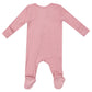 Introducing the Angel Dear Bamboo Bridal Rose 2 Way Zipper Footie: a pink onesie with long sleeves, footies, and white polka dots, crafted from soft bamboo fiber fabric.