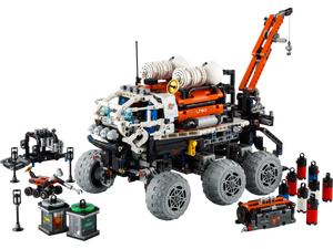 The LEGO® Technic Mars Crew Exploration Rover set from Legos - Toyhouse includes six wheels, a robotic arm, and various scientific instruments, making it ideal for navigating Martian landscapes.