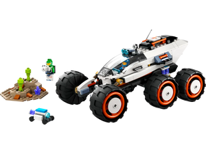 The LEGO® City Space Explorer Rover and Alien Life set from Legos - Toyhouse features a six-wheeled rover, green alien minifigures, a smaller robot, rocky terrain pieces with accessories, and energy crystals for endless adventures.