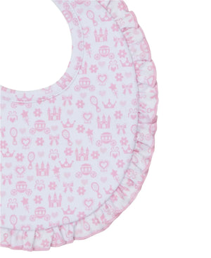 The Kissy Kissy Royal Details Bib by Kissy Kissy is a round baby bib adorned with a frilled edge. It is crafted from absorbent terry cloth and features a pink pattern of crowns, hearts, mirrors, and flowers on a white background.