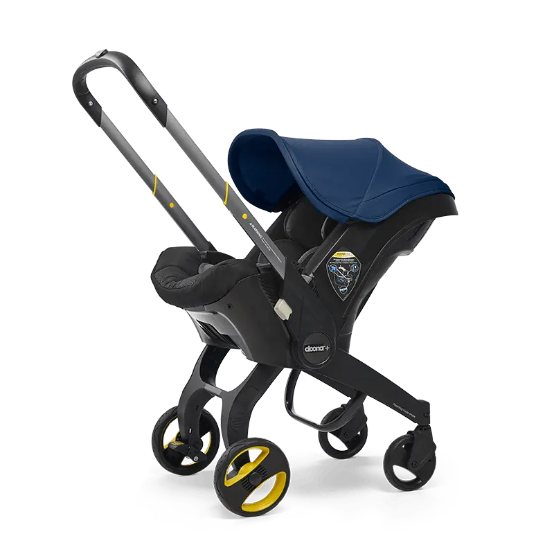 The Doona Car Seat and Stroller by Doona is a versatile baby stroller in blue and black with yellow wheel accents. It features a convertible design that effortlessly transitions from a car seat to a stroller.