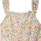 The Bonpoint Baby Girls' and Girls' Cecilia Ruffled Swimsuit features Liberty fabric with pastel pink, blue, yellow, and green floral prints on white and charming ruffled shoulder straps.