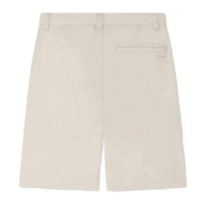 The Boys' Elois Short by Bonpoint is a beige, knee-length style for boys, made from organic cotton with belt loops and a right-side back pocket, shown from the back.