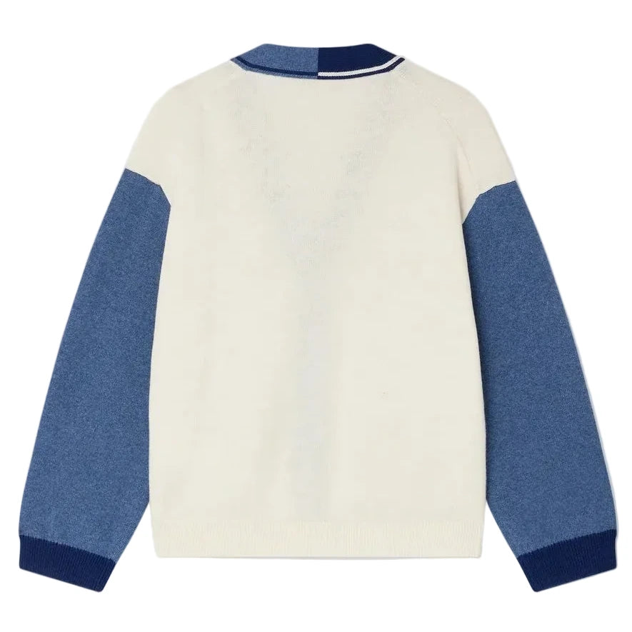 The Bonpoint Boys' Loris V-neck Cardigan features a cream body, blue sleeves, and dark blue cuffs in a three-tone design, shown from the back.