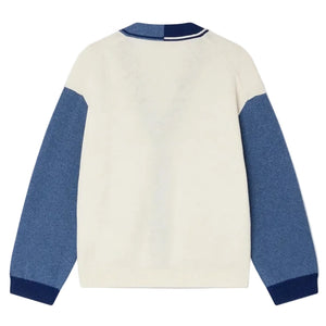 The Bonpoint Boys' Loris V-neck Cardigan features a cream body, blue sleeves, and dark blue cuffs in a three-tone design, shown from the back.