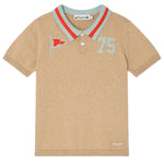 The Bonpoint Boys' Loyal Polo with Inlay 75 Flag features a retro beige design, a red and mint green striped collar, a flag patch, the number 75, and an embroidered logo near the hem.