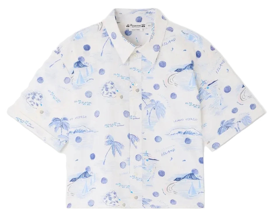 The Boys' Erian Shirt by Bonpoint features short sleeves and a button-up front, made from soft organic cotton in white with blue island-themed illustrations of palm trees, sailboats, and waves.