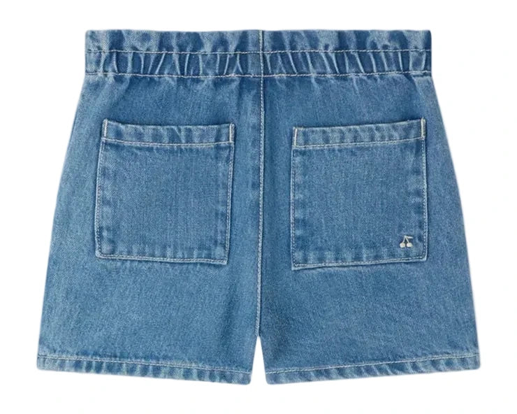 Back view of Bonpoint Girls' Milly Shorts featuring an elastic waistband and two large square back pockets.