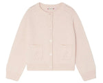 The Bonpoint Girls' Elisea Round Neck Cardigan in Organic Cotton is light pink with long sleeves, front white buttons, and two small front pockets.