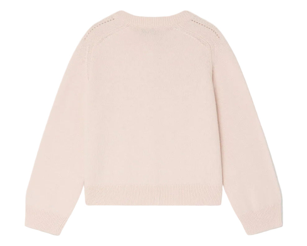 The Bonpoint Girls' Elisea Round Neck Cardigan in Organic Cotton is displayed flat with the back facing up, showcasing its light pink color, long sleeves, and openwork knit design.