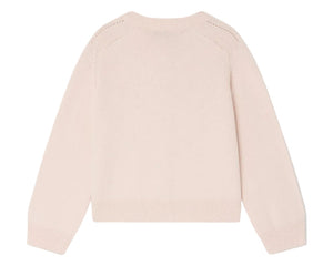 The Bonpoint Girls' Elisea Round Neck Cardigan in Organic Cotton is displayed flat with the back facing up, showcasing its light pink color, long sleeves, and openwork knit design.