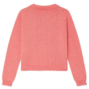 The Bonpoint Girls' Scalloped Round Neck Larita Cardigan is shown from the back, featuring pink cotton knit fabric, ribbed cuffs and waistband, with scalloped lace trim at the collar and hem.