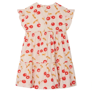 The Bonpoint Girls' Leontine Dress with Ruffles features a cherry print on light pink, short ruffled sleeves, and a loose, flowing fit for a playful style.
