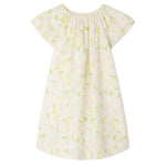 The Bonpoint Girls' Smocked Salomé Dress features a light pink, short-sleeve design with a loose fit, gathered neckline, and playful lemon, leaf, and cherry print. Made from soft organic cotton for all-day comfort.