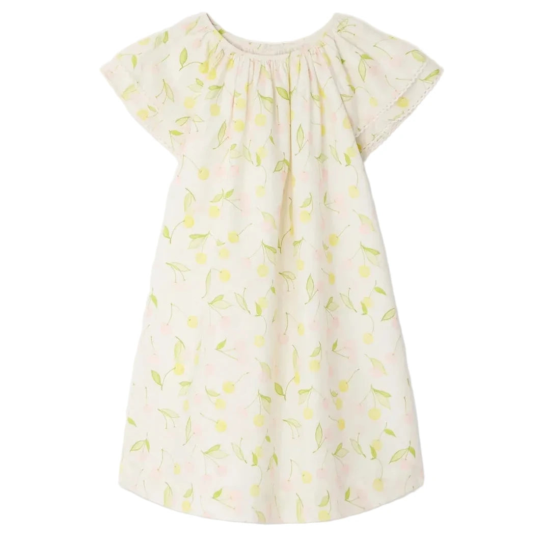 The Bonpoint Girls' Smocked Salomé Dress features a light pink, short-sleeve design with a loose fit, gathered neckline, and playful lemon, leaf, and cherry print. Made from soft organic cotton for all-day comfort.