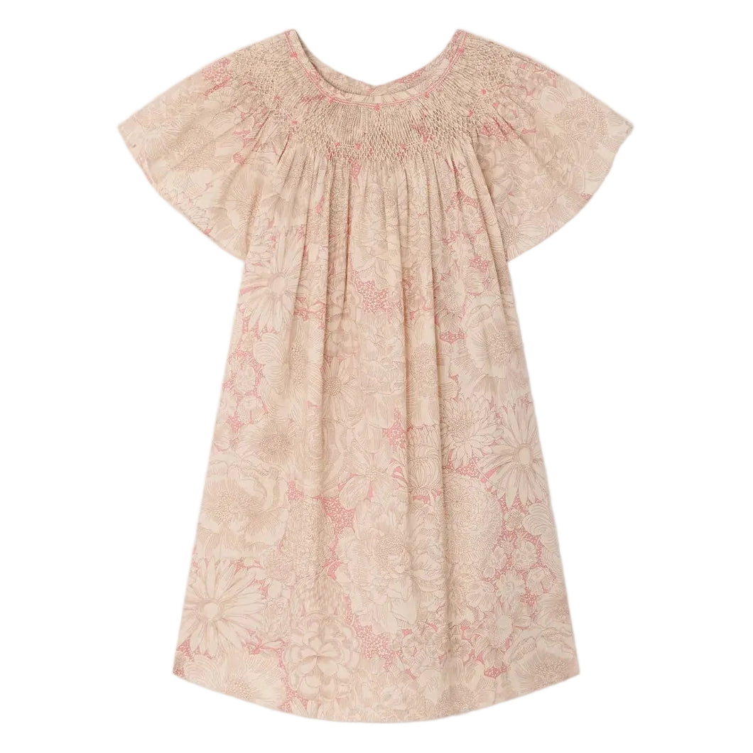 The Bonpoint Girls' Arlene Dress features hand-embroidered smocking, short sleeves, knee-length cut, pink and cream floral Liberty fabric, a gathered neckline, and loose fit. Displayed on a white background.