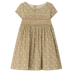 The Bonpoint Girls' Duchesse Smocked Dress features short sleeves, a knee-length cut, floral print in beige, green, and pink, and hand-embroidered smocking across the chest.