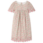 The Bonpoint Girls' Lysiane Dress features English embroidery, a gathered bodice, scalloped edges, and a charming pink floral print on soft Liberty fabric.