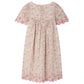 The Bonpoint Girls' Lysiane Dress features English embroidery, short sleeves, a knee-length cut, and scalloped edges for a charming finish.