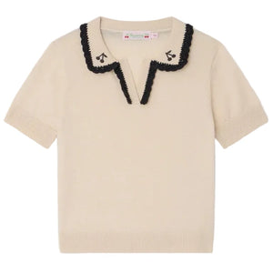 The Bonpoint Girls' Lisette Sweater features short sleeves, a cream knit, a scalloped black-trimmed notched lapel collar, and delicate hand-embroidered cherries near the neckline.